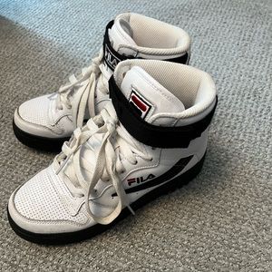 Gently used, Woman’s Fila White high tops. US Size 5.